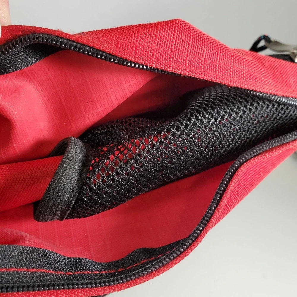 AMPAC Bag Sling Backpack Red Black Shoulder Strap Adjustable Zip Many Pockets